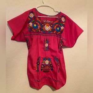 Blouse says it's size L but runs  large